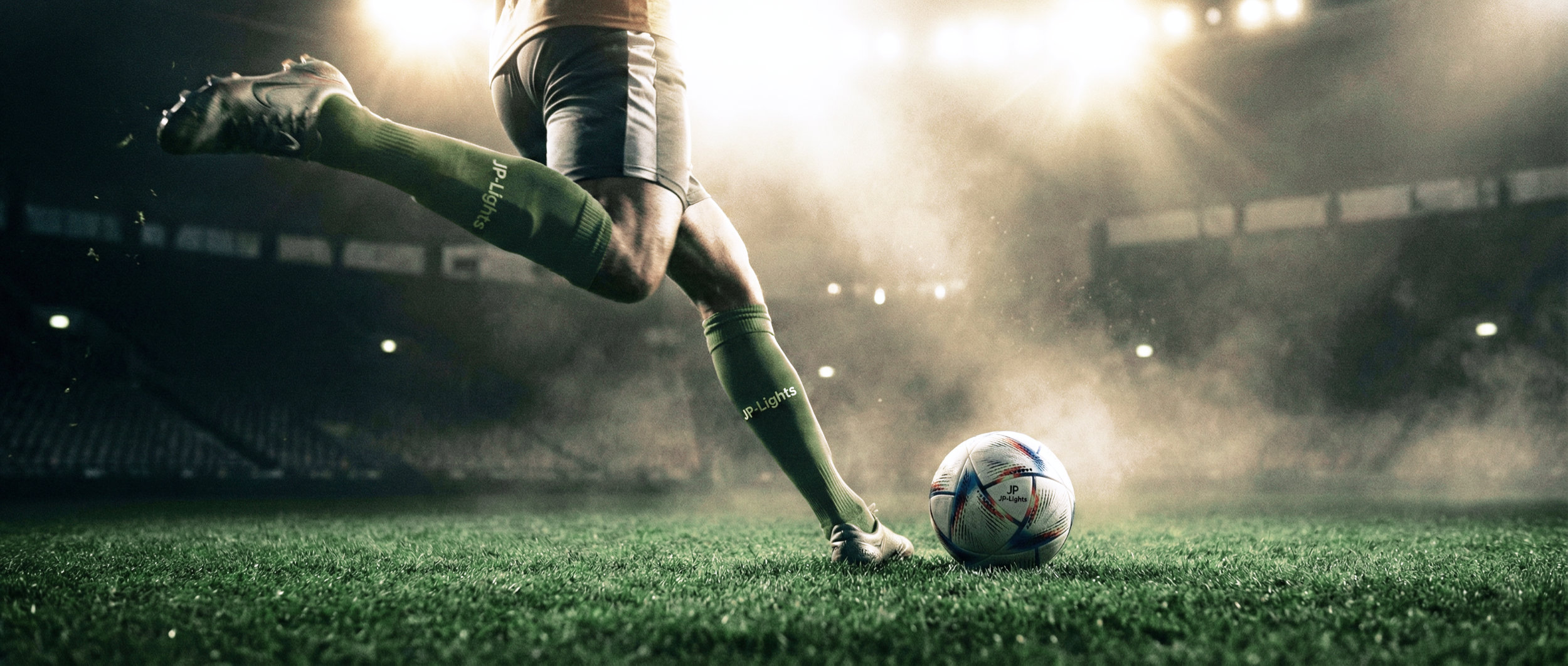 JP Lights Promo image with a closeup of a footballer kicking a ball in a cinematically lit stadium